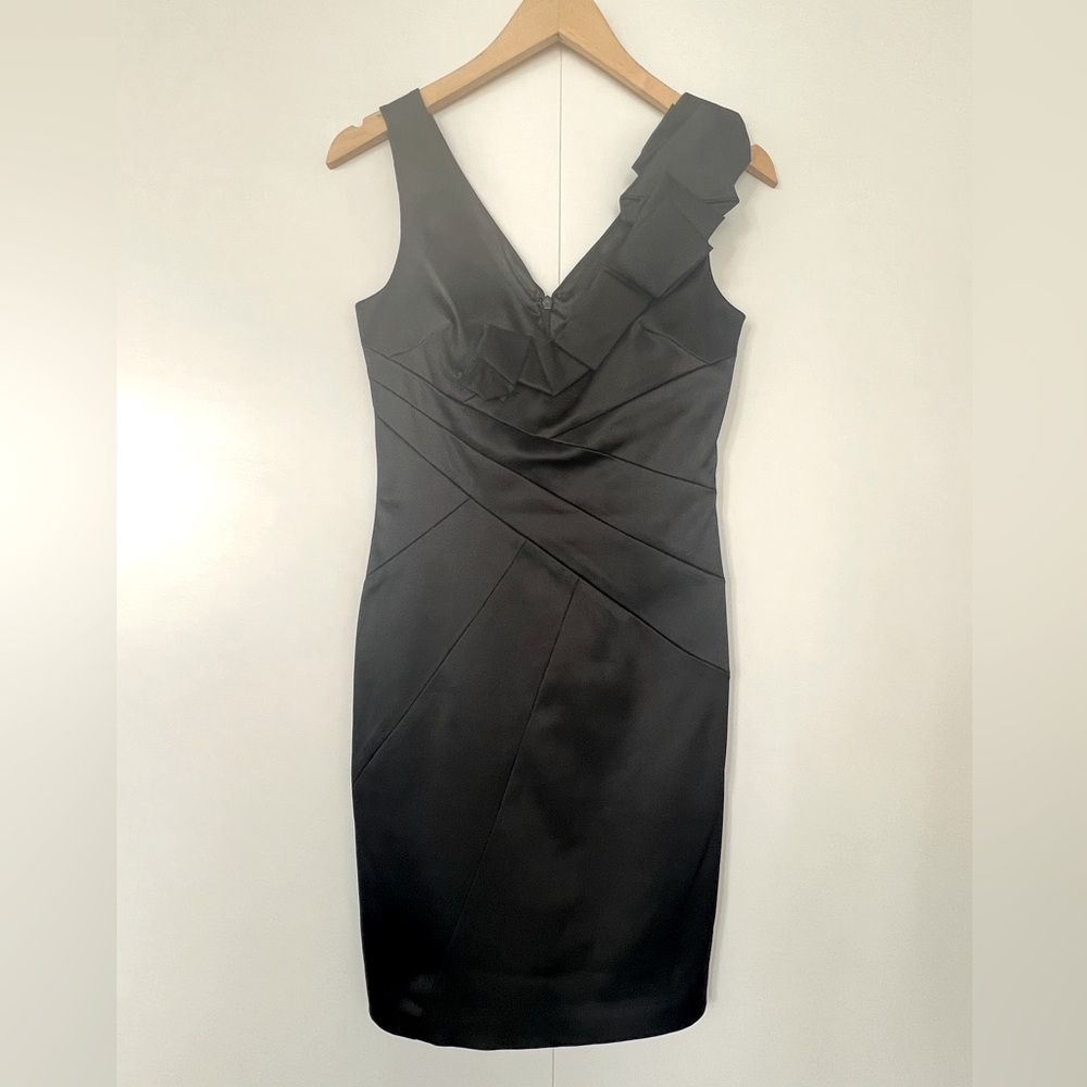 Black satin dress with origami neckline